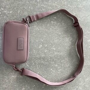 Lightly used Dagne Dover Mara neoprene phone sling in “dune”